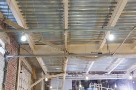 insulate a garage ceiling rafters