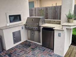 These designs are more like actual kitchens except the main cooking are is an outdoor grill instead of check out the complete outdoor kitchen designs with bar, seating area, storage, and grill. 24 Best Small Outdoor Kitchens Ideas Small Outdoor Kitchens Outdoor Kitchen Outdoor