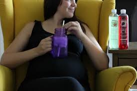 summer pregnancy with sparkling ice