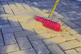 remove polymeric sand from pavers
