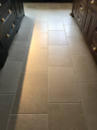 quest for tumbled limestone flooring in