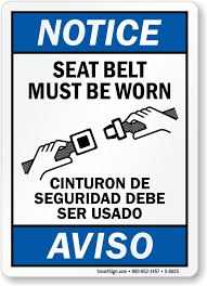 bilingual seat belt must be worn sign