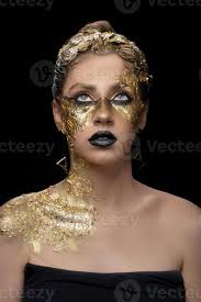 beautiful young woman with golden foil