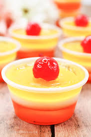 layered piña colada jello shots tasty