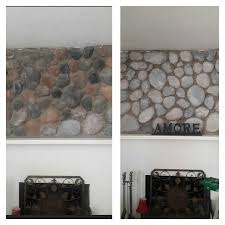 white washed river rock fireplace