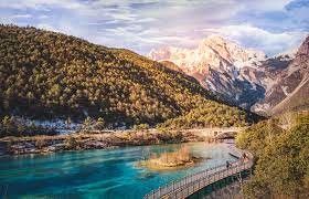 It is located about 100 kilometers (60 miles) northwest of lijiang old town, lying between jade dragon snow mountain (yulong xueshan) and haba snow mountain (haba xueshan). Yulong Xue Shan Jade Dragon Snow Mountain Lijiang China China Travel Guide Net