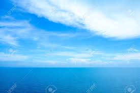 Calm Sea Ocean And Light Blue Sky Background