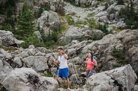 couple hiking through rugged landscape