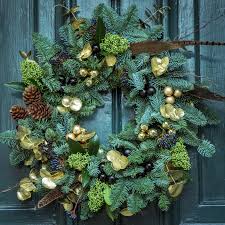 How to hang a wreath on the door. How To Hang A Christmas Wreath Without Damaging Your Door