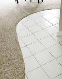 curved transition from carpet to tile