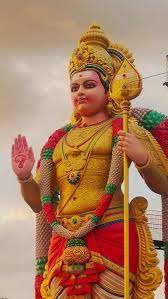 lord murugan golden statue lord