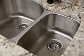 install a double sink drain system