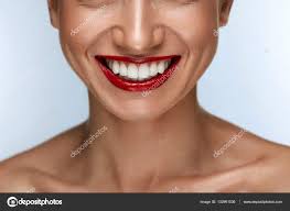 white teeth and red lips stock photo