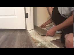 how to cut vinyl plank flooring around