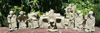 The destination has set up a new exhib. Alice In Wonderland Set With The Trumps Garden Ornament Sculpture Stone Gift Garden Ornaments Alice In Wonderland Alice In Wonderland Furniture