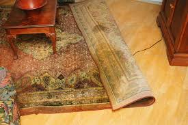 cleaning oriental rug using an odor