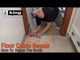 damaged electric floor heating system