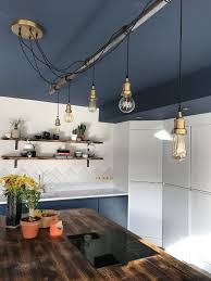 Two ombre mirrored pendant lights from west elm add striking style to this beautiful kitchen. 25 Kitchen Lighting Ideas How To Plan Your Kitchen Lighting Scheme Like A Pro Real Homes