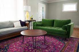Green Couch And Pink Rug