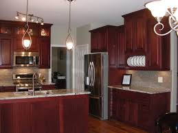 Another perk is that it takes stains and finishes quite well and sets to a smooth finish. Grey Kitchen Walls With Cherry Cabinets Cherry Wood Kitchen Cabinets Grey Kitchen Walls Cherry Wood Kitchens