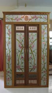 ideal pooja room glass door design