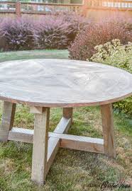 Maurits round marquetry table in reclaimed oak with brass legs. Salvaged Wood Beam Round Dining Table The Created Home