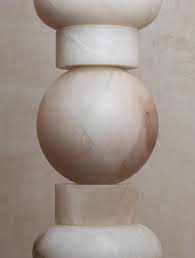 The former use it in a wider sense that includes varieties of two different minerals: Alabaster Totem 16