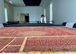 live restoration of mamluk dynasty carpet