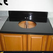 The speckled granite countertop is with rich tobacco finish accompanies nearly any decor. Shanxi Black Granite Countertops Bathroom Vanity Cabinet Bathroom Cabinet Black Granite Vanity Tops Polished Black Granite Bathroom Vanity Tops Custom Vanity Tops China Black Stone Bathroom Vanity Top Stonecontact Com