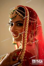 smiling indian bride looking at the