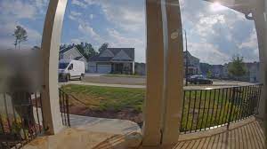 Doorbell camera catches Amazon driver ...