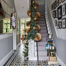 Add these festive additions to your steps, railings, and banisters. Christmas Hallway Decorating Ideas To Impress Your Guests