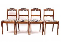 quartet of elegant walnut dining chairs