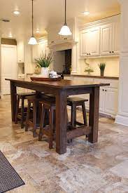 We also need a mixer table but i did not have enough weathered boards for that. Rustic Farmhouse Bar Island Table With 6 Barstools In 2021 Rustic Kitchen Island Rustic Kitchen Kitchen Island Table
