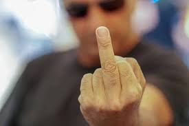 Man giving the middle finger. Selective focus - Stock Image - Everypixel