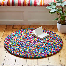 handmade felt ball rug in multicolour