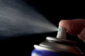 inhaling deodorant spray