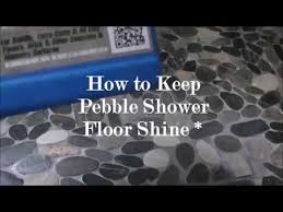 how to clean pebble shower floor best