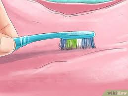 Scrub off the mold stain apply a mold stain remover, such as household soap, white vinegar or bleach, and use a toothbrush to brush off the surface mold. 3 Ways To Get Mold Out Of Clothing Wikihow