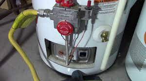 How to relight a water heater pilot light - YouTube