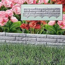 grey brick wall garden border plastic