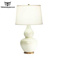 In contemporary homes, a modern table lamp isn't just something used in close quarters to brighten the area, but an opportunity to express sophisticated style. Nordic Retro White Table Lamp Modern Art Living Room Bedroom Bedside Lamp Home Deco Table Lights Nightstand Table Lamps For Desk Buy At The Price Of 128 80 In Aliexpress Com Imall Com