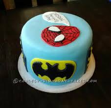 This free cake, decorated with icing, a border, and an inscription, is the baby's own cake to enjoy. Super Hero Personalized Birthday Cake