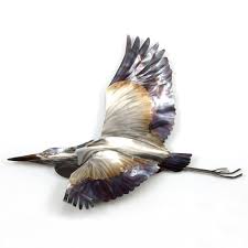 blue heron flying coastal bird metal