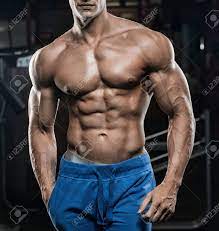 Handsome Man With Big Muscles, Posing At The Camera In The Gym Stock Photo,  Picture and Royalty Free Image. Image 76109629.
