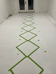 how to paint concrete floors with a