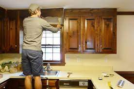 First, prepare the room by removing all your dishes, pots, and pans from the cabinets. Removing Some Kitchen Cabinets Rehanging One Young House Love