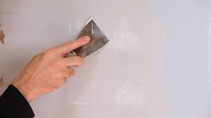how to fix small holes drywall repair