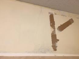 Wallpaper And Damaged Drywall