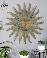 large metal sun wall decor bronze green
